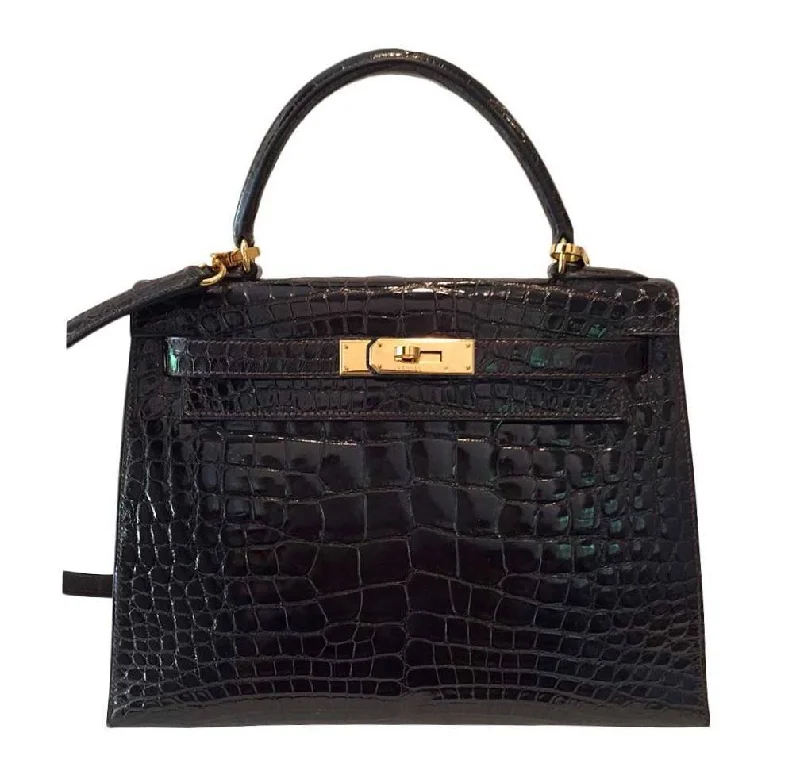 Hermès Kelly Bags in a deep indigo blue for a classic and sophisticated lookHermès Kelly 28 Sellier Alligator Gold Hardware