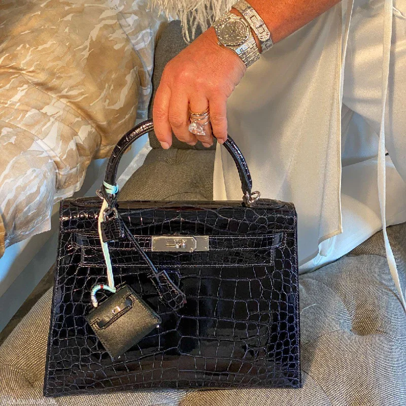 Hermès Kelly Bags in a rare shade of royal purple for a statementHermès Kelly 28 Sellier Verso Blue Marine Nilo Crocodile & Rose Scheherazade Palladium Hardware - 2019, D