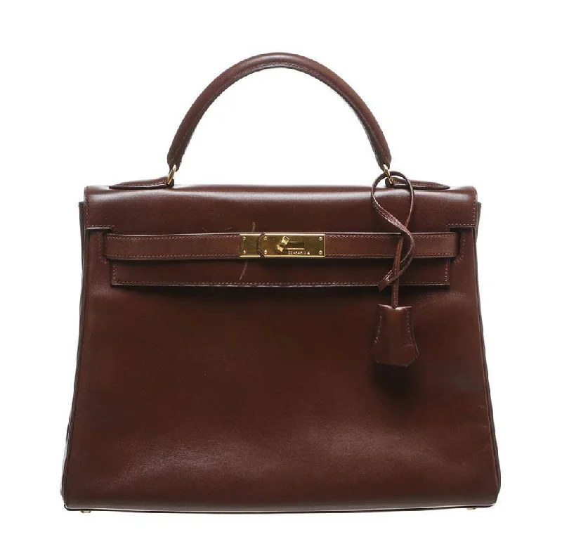 Hermès Kelly Bags with a back - pocket for additional storageHermès Kelly 32 Brown Bag GHW