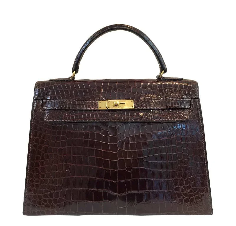 Hermès Kelly Bags with a hand - burnished edge finish for a vintage charmHermès Vintage Kelly Crocodile Bag 32cm