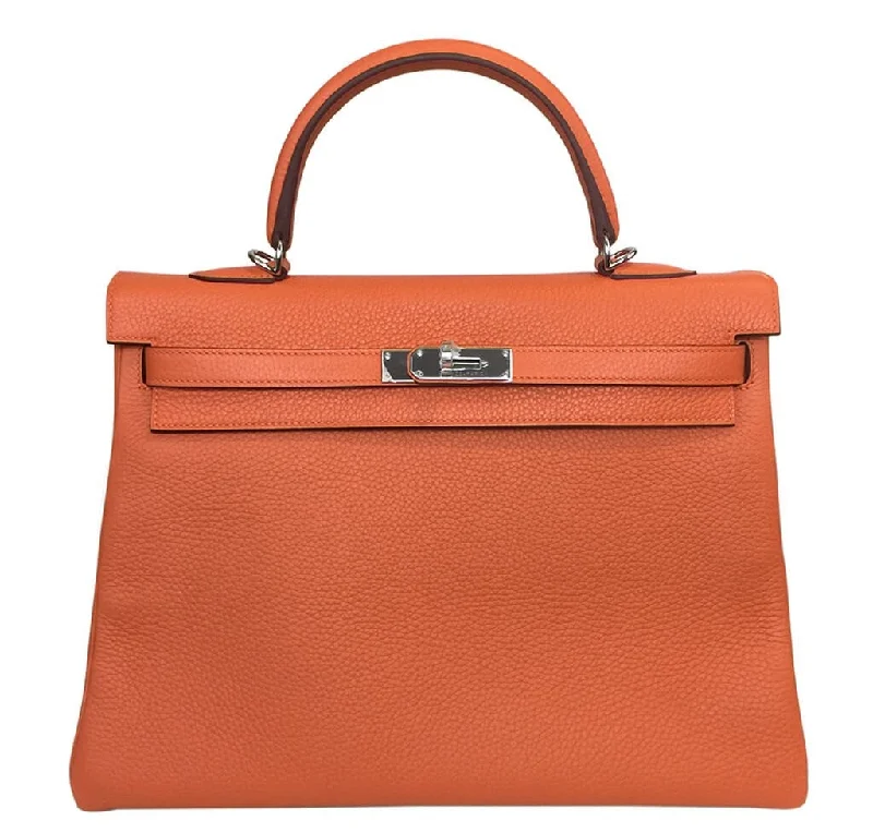 Hermès Kelly Bags with a zip - around interior pocketHermès Orange Kelly Togo Bag 35cm