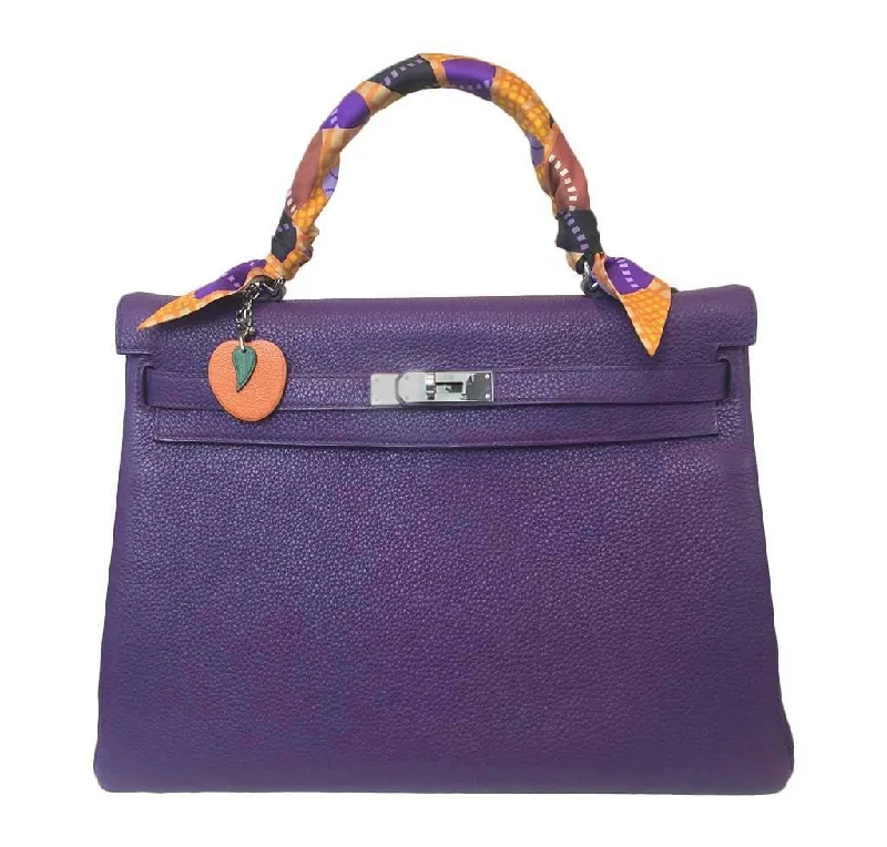 Hermès Kelly Bags featuring hand - painted floral motifsHermès Kelly 35 Ultraviolet Bag PHW