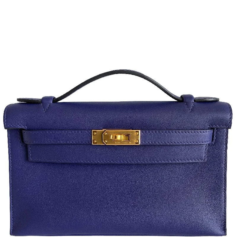 Hermès Kelly Bags featuring hand - painted floral motifsHermès Kelly Mini Pochette Blue Encre Swift with Gold Hardware