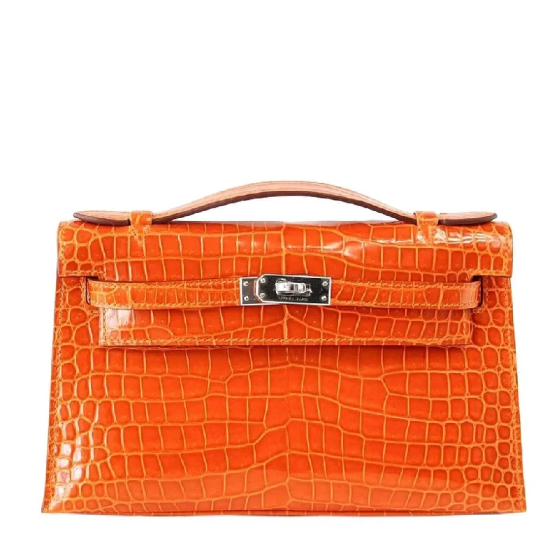 Hermès Kelly Bags with a flap - over closure and turnlock for a classic lookHermès Kelly Pochette Bag Feu Porosus Crocodile