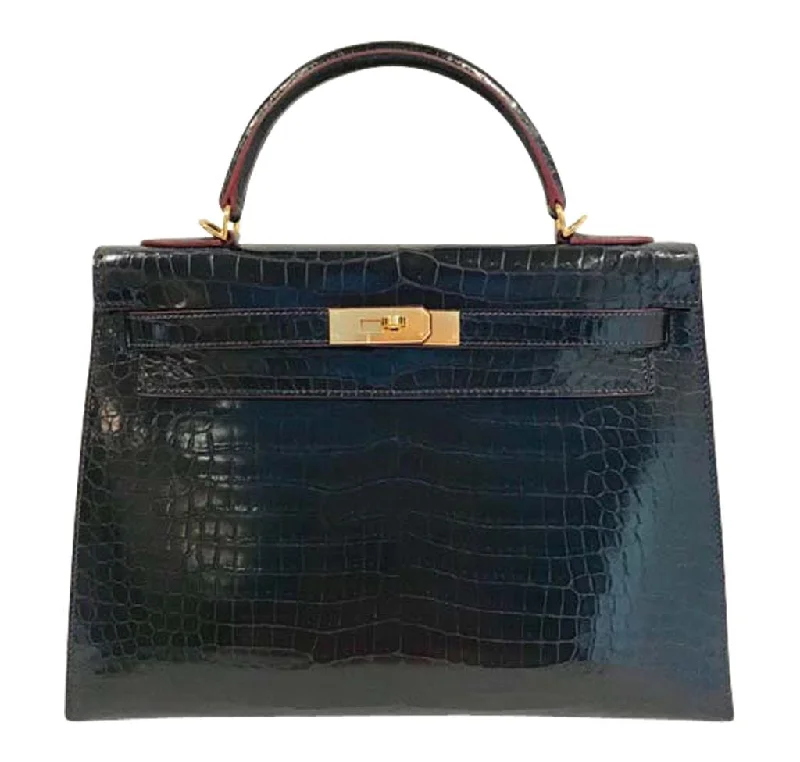 Hermès Kelly Bags with a flap - over closure and turnlock for a classic lookHermès Kelly 32 Bleu Marine Crocodile