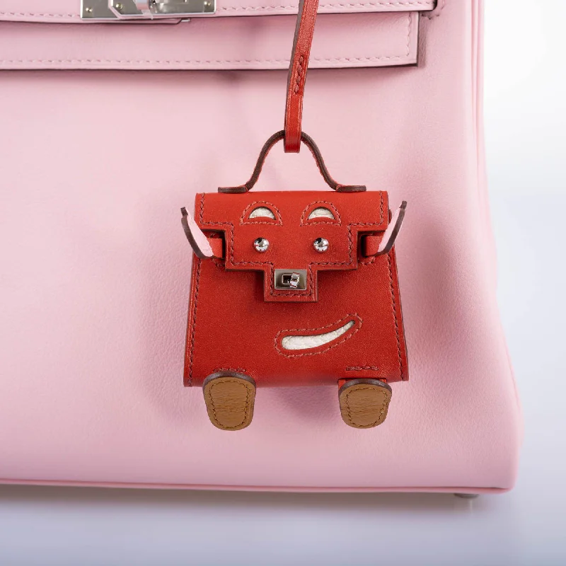 Hermès Kelly Bags with a flap - over closure and turnlock for a classic lookHermès Micro Kelly Quelle Idole Bag Charm Rose Sakura, Sanguine, Nata, Sesame, Tadelakt Leather- 2021, Z