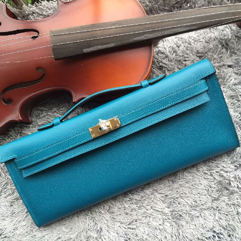 Hermès Kelly Bags with a hand - stitched leather handle for artisanal charmHermes Turquoise Handcrafted Kelly Cut Clutch